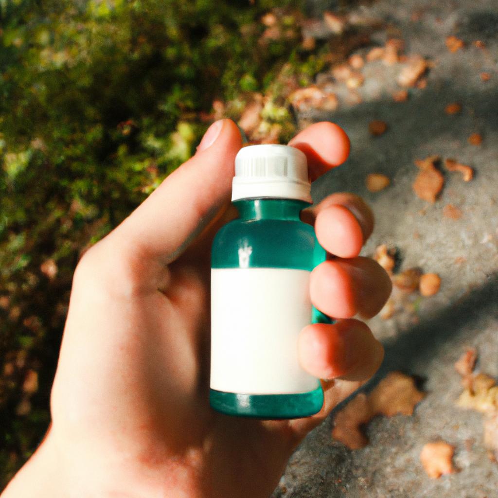 Person holding herbal medicine bottle